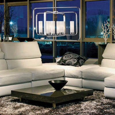 Pendant Lighting Transitional AIDEEN Z-Lite 6000-8A-CH lighted in a living room with white leather sofa
